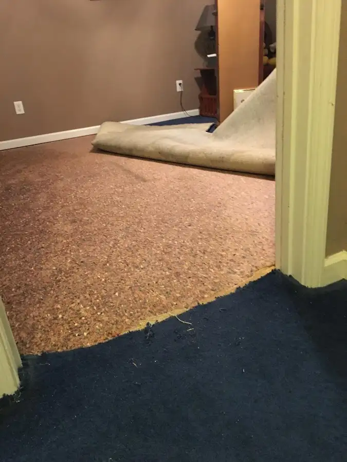Carpet pad removal revealing water damage during Drying & Dehumidification in Los Osos