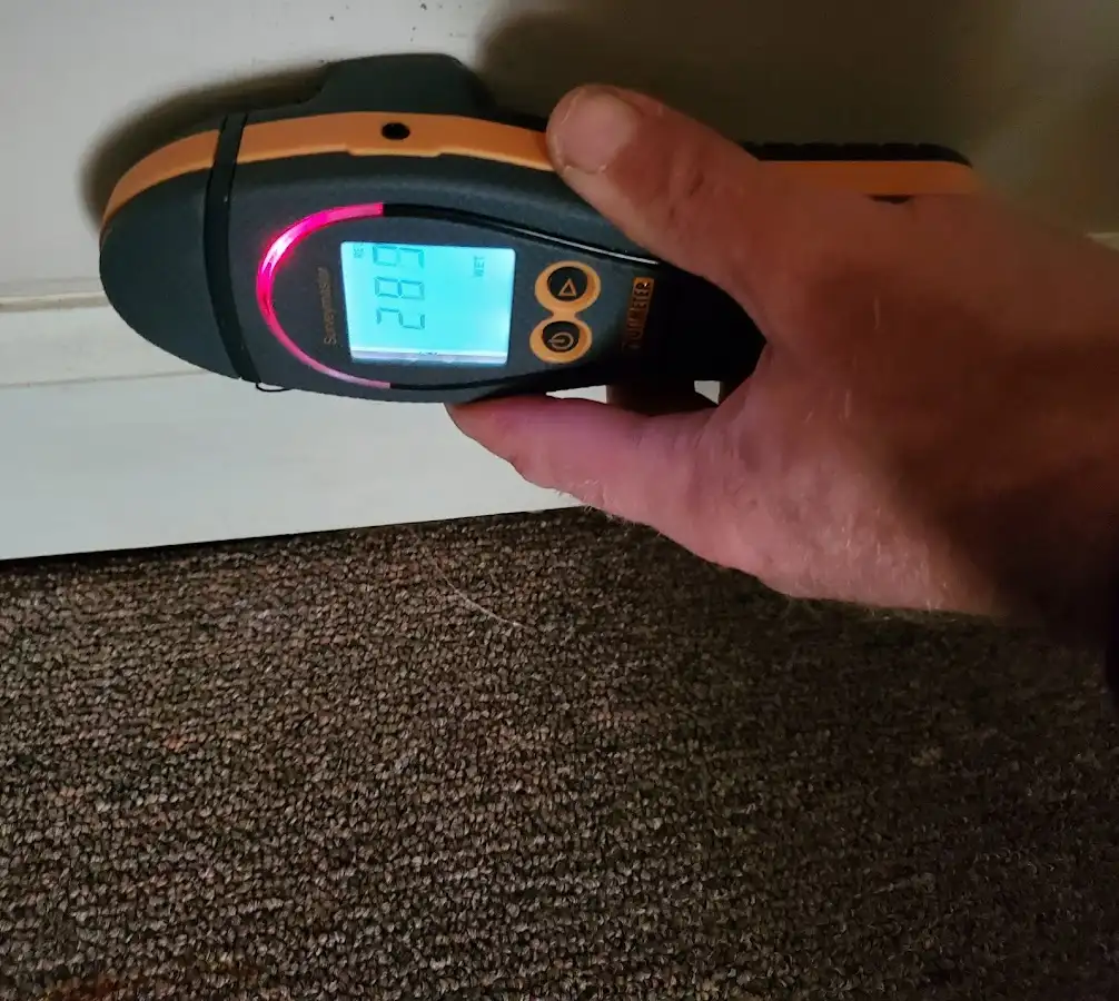 Moisture detection at baseboard during Storm Damage Restoration in Los Osos